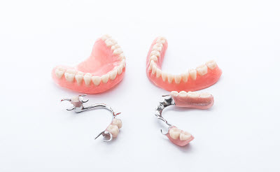 close up of Livonia partial dentures and full arch dentures